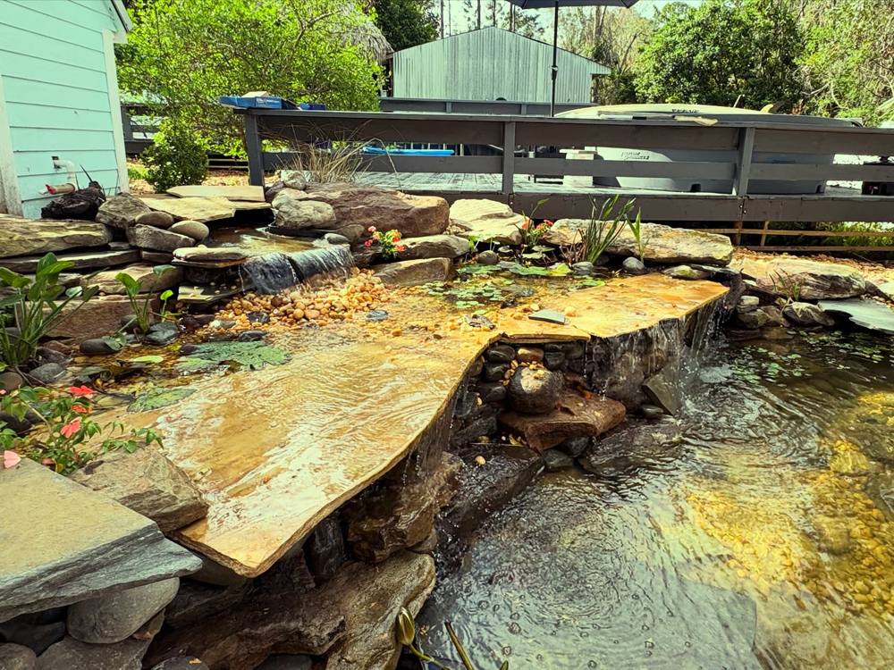 Flagstone ledge pond with a waterfall